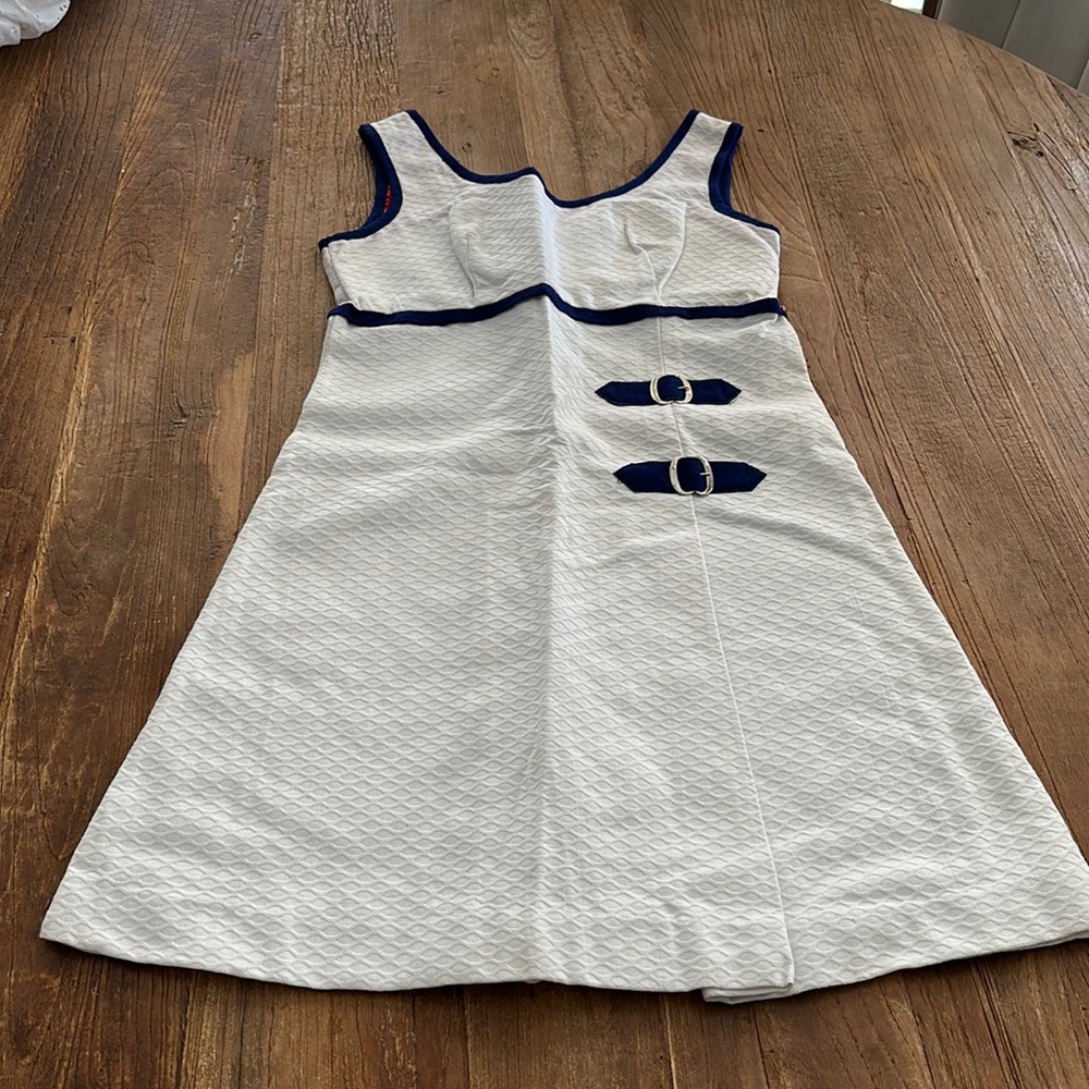 Vintage tennis dress. 14 inches across chest 33 inches long.
